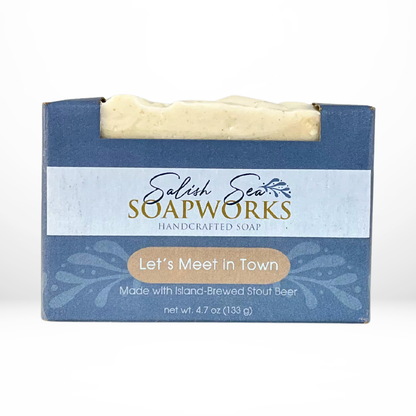 Front view of the 'Let's Meet in Town' bar of soap in Salish Sea Soapworks packaging.