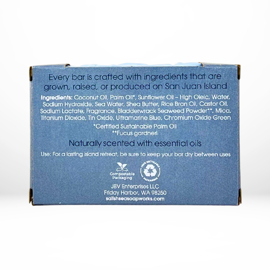 Back view of the 'Granny's Tidepool' bar of soap with packaging with a view of the ingredients list and details