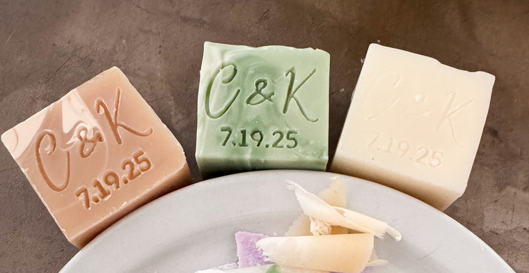 Assorted handmade soap bars on a white plate with 'C&K' branding and the date 7/19/25.